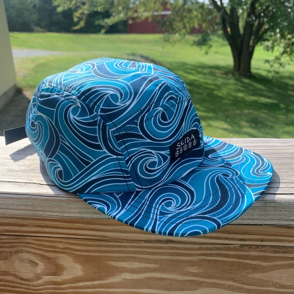 Skida baseball brim hat in blue wave pattern